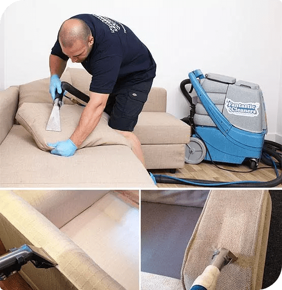A professional technician using a hot water extraction machine to perform Upholstery Cleaning Dunedin on a beige fabric sofa, ensuring deep cleaning and stain removal.